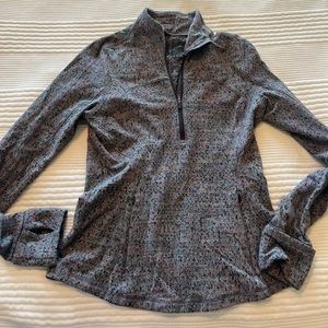 Lululemon half zip running shirt. Warm gray with small colored speckles. Size 8.